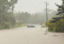 Flash flooding: Roads closed at Moore Park Beach