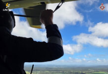 Woman trapped by floodwaters airlifted after snakebite